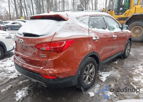 2015 Hyundai Santa Fe Sport 2.4L z USA, uszkodzony, nr VIN 5XYZUDLB8FG294511